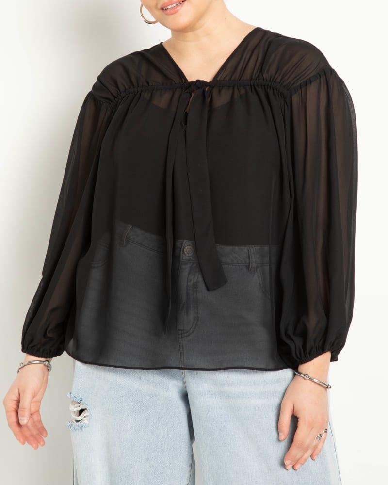 Front of a model wearing a size 22 Tunnel Detail Chiffon Blouse- Black Onyx in Black Onyx by ELOQUII. | dia_product_style_image_id:283712